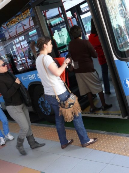 People getting in an EMT bus